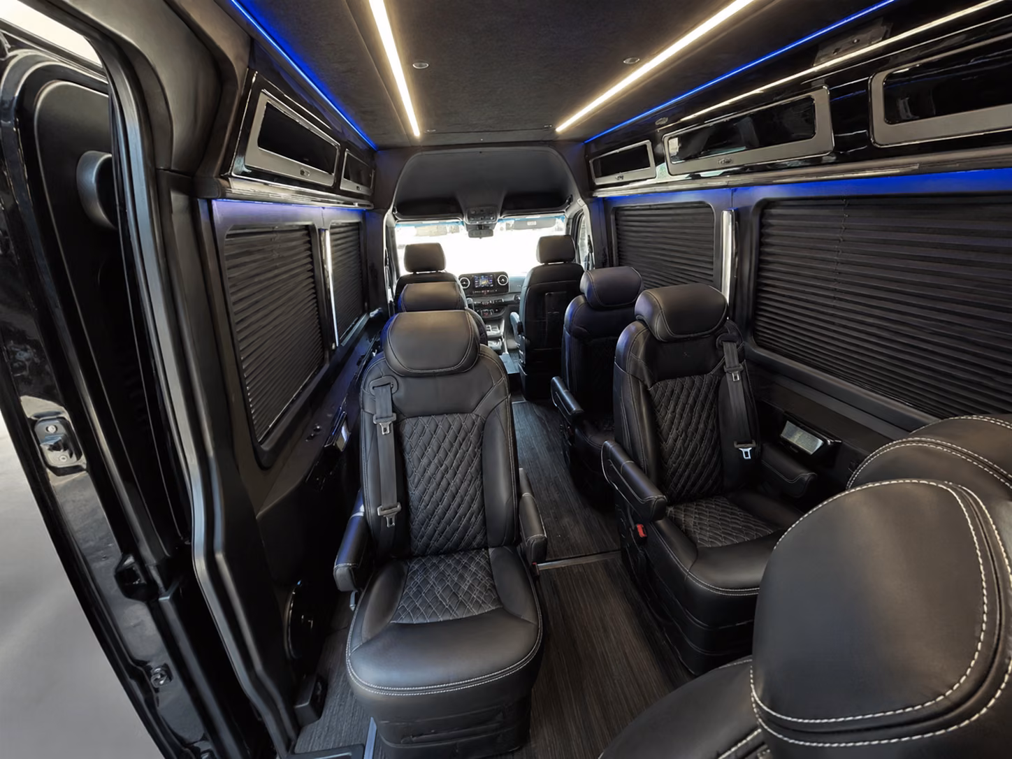 auburn sprinter van with driver inside