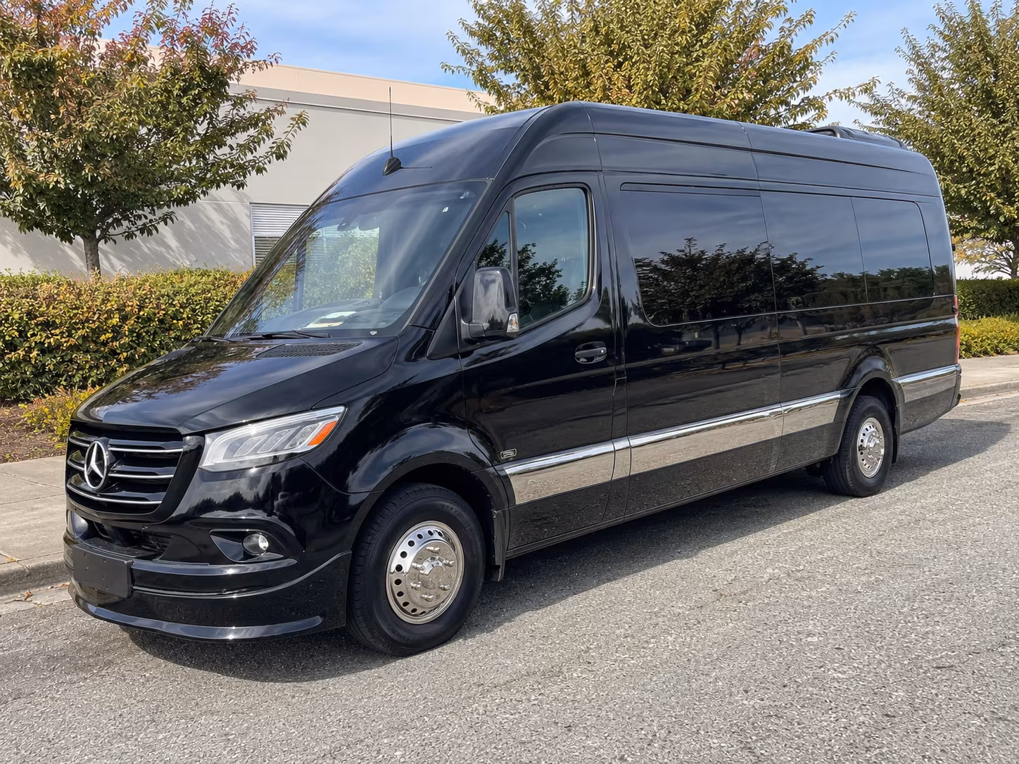 auburn sprinter van with driver